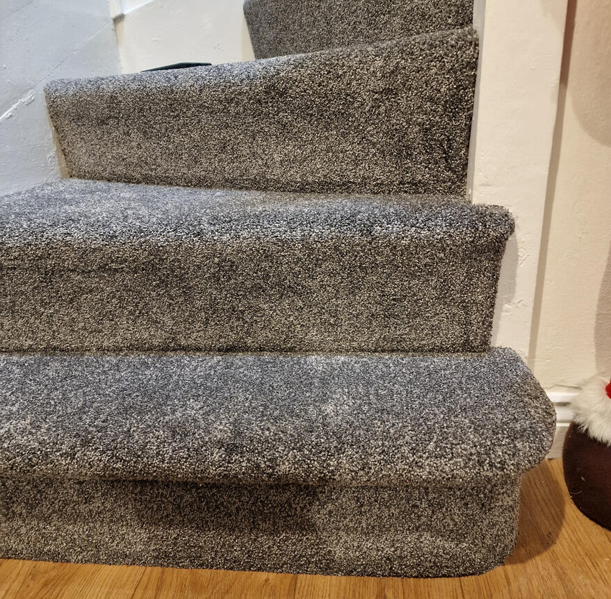 Stair carpeting including bullnose